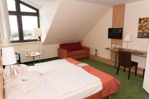 Ένα ή περισσότερα κρεβάτια σε δωμάτιο στο Hotel und Landgasthof Zum Bockshahn