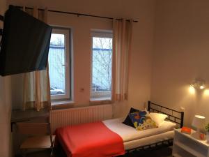 Posteľ alebo postele v izbe v ubytovaní Arcus Premium Hostel