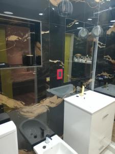 Et badeværelse på La Mar Grande + 33 billeder