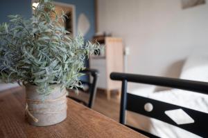 Postel nebo postele na pokoji v ubytování Mont'bistro