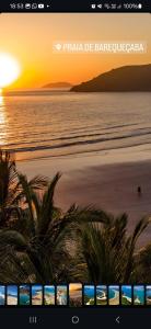 a computer screen showing a beach at sunset at Casa Confortável Próximo a Lindas Praias in São Sebastião