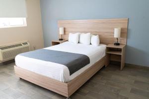 Postel nebo postele na pokoji v ubytování Dunas Hospedaje