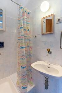 Kúpeľňa v ubytovaní Apartment Mici 1