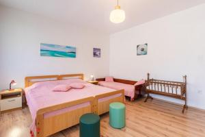Posteľ alebo postele v izbe v ubytovaní Apartment Mici 1
