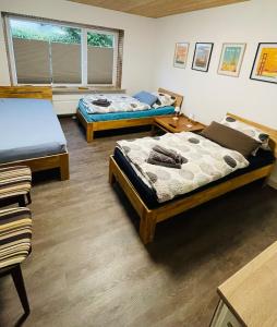Postel nebo postele na pokoji v ubytování Ferienhaus Sophie - ideal für Familie & Monteure