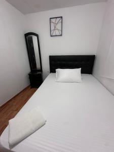 Postel nebo postele na pokoji v ubytování Hotel Yellow Maraya, Pereira