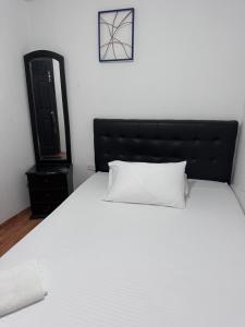 Postel nebo postele na pokoji v ubytování Hotel Yellow Maraya, Pereira