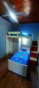 Ένα ή περισσότερα κρεβάτια σε δωμάτιο στο La Casita de Máximo