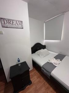 Postel nebo postele na pokoji v ubytování Hotel Yellow Maraya, Pereira