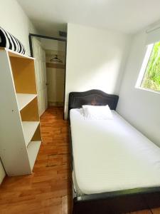 Postel nebo postele na pokoji v ubytování Hotel Yellow Maraya, Pereira