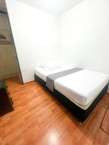 Postel nebo postele na pokoji v ubytování Hotel Yellow Maraya, Pereira