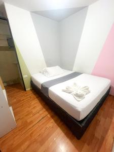 Postel nebo postele na pokoji v ubytování Hotel Yellow Maraya, Pereira