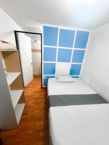 Postel nebo postele na pokoji v ubytování Hotel Yellow Maraya, Pereira