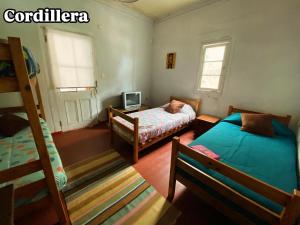 Katil atau katil-katil dalam bilik di Selva Hospedaje