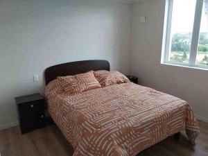 Ένα ή περισσότερα κρεβάτια σε δωμάτιο στο Departamento en osorno