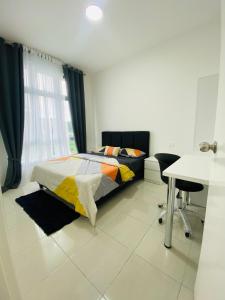Ένα ή περισσότερα κρεβάτια σε δωμάτιο στο Aiqa homestay +14 φωτογραφίες
