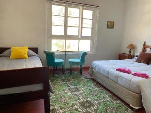 Katil atau katil-katil dalam bilik di Selva Hospedaje