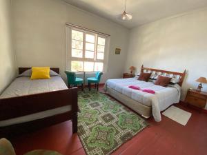 Katil atau katil-katil dalam bilik di Selva Hospedaje