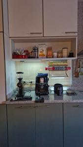 a kitchen with a counter top with a blender on it at Nature's Hideaway Homestay in Ban Lam Thong Lang