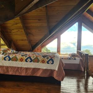 Postel nebo postele na pokoji v ubytování Cabaña Rancho Don Marino