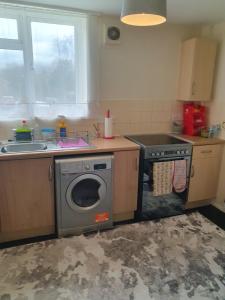 Η κουζίνα ή μικρή κουζίνα στο Cosy Apartment