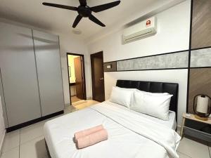 a bedroom with a white bed with a ceiling fan at KSL Premium-Style 3R3B 1-5Pax #Daya#Austin#Ikea in Johor Bahru +38 photos