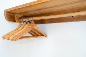 a wooden table with a wooden dowel on it at Villa Casamo in Bali in Badung