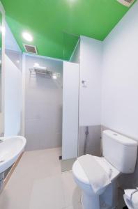 Koupelna v ubytování Whiz Prime Hotel Balikpapan