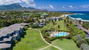 an aerial view of the resort and the ocean at Poipu Sands 437: 2BR Ocean View Condo w/ A/C, pool in Koloa