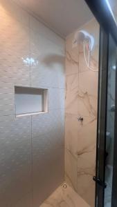 Vannituba majutusasutuses Quarto Aconchegante N 1