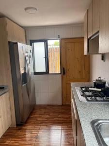 Η κουζίνα ή μικρή κουζίνα στο Casa de verano +1 φωτογραφίες