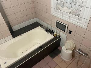 Koupelna v ubytování ホテルロサージュ