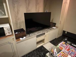 Kuchyň nebo kuchyňský kout v ubytování ホテルロサージュ + 12 fotografií