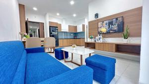 Η κουζίνα ή μικρή κουζίνα στο Mermaid Seaview Sát Tháp Tam Thắng - Blue Homestay
