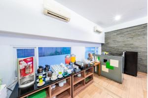 Kuchyň nebo kuchyňský kout v ubytování Whiz Prime Hotel Balikpapan
