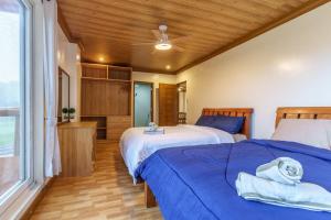 Postel nebo postele na pokoji v ubytování Luxury Residence #2 Camp John Hay nr Eco Trails