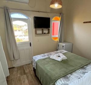 En eller flere senge i et værelse på Pousada Vista ao Farol + 51 billeder