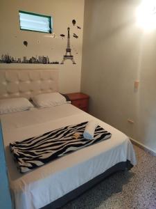 Letto o letti in una camera di Hotel Casa Verde Guatapé