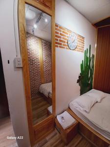 Postel nebo postele na pokoji v ubytování Homestay HoLo