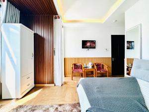 TV a/nebo společenská místnost v ubytování Dalat ECO Hotel 2
