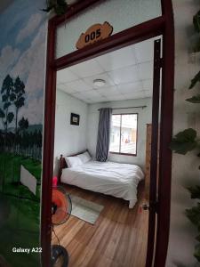 Postel nebo postele na pokoji v ubytování Homestay HoLo