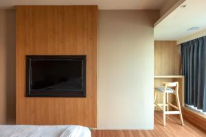Postel nebo postele na pokoji v ubytování E Lim Hotel