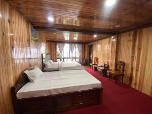 Katil atau katil-katil dalam bilik di Magnolia Farmhouse and Homestay +24 gambar