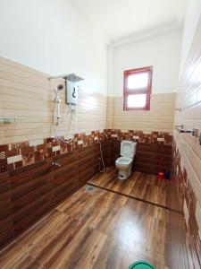 a bathroom with a toilet and a shower at Luxury Peak Villa in Mirissa +54 photos