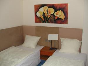 Postel nebo postele na pokoji v ubytování Motel Monteur