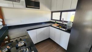 Η κουζίνα ή μικρή κουζίνα στο Casa Olivo, Sala a doble altura