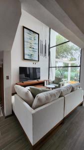 Χώρος καθιστικού στο Casa Olivo, Sala a doble altura +16 φωτογραφίες