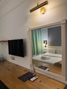 TV a/nebo společenská místnost v ubytování Hotel Deleeton