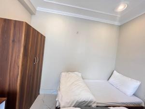 Voodi või voodid majutusasutuse Hotel Grand Safari toas