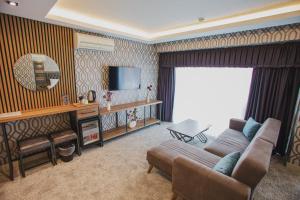 A television and/or entertainment centre at Prusias Otel